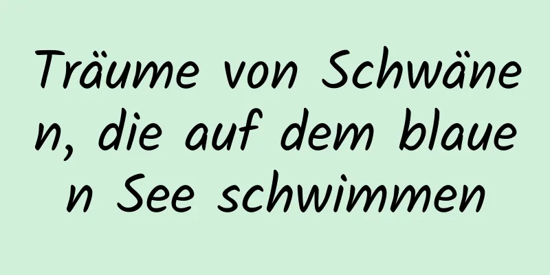 Träume von Schwänen, die auf dem blauen See schwimmen